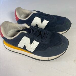 New Balance Navy Blue Sneakers with White 'N' and Yellow Accent